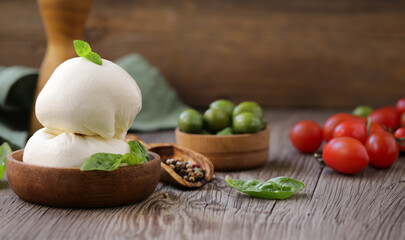 mozzarella cheese for salad with tomatoes and basil
