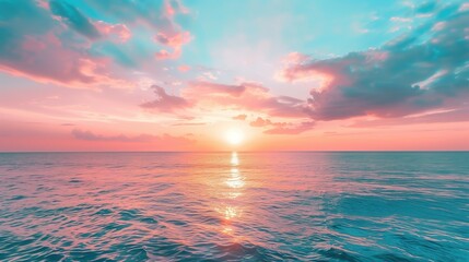 Fototapeta premium Beautiful sunset over the sea with pink and orange sky