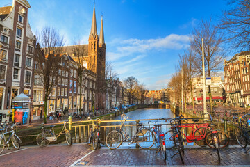 Cityscape on a sunny winter day - view of the water channel from the bridge in the historic center...