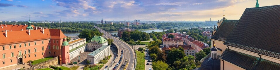 Cityscape, panorama, banner - top view of the Silesian-Dabrowa Bridge over the Vistula River from the Old Town to the neighbourhood of Old Praga, in center of Warsaw, Poland