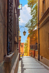 Cityscape - view of narrow streets with old houses in the Old Town of Warsaw, Poland