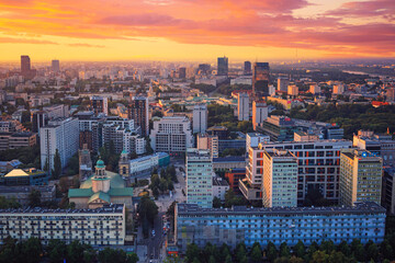Cityscape at sunset - top view of central Warsaw, the neighbourhood of Zelazna Brama, located...