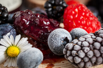 berry fruit close up macro with jam and flower 