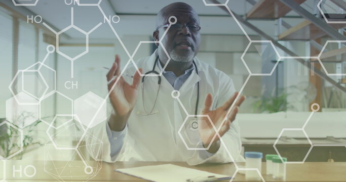 Image of chemical formulas over african american doctor - Powered by Adobe