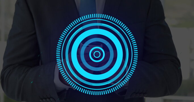 Image of processing circle over hands of caucasisn man using smartphone