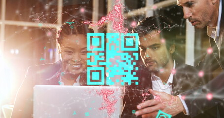 Image of qr code and connected dots over multiracial coworkers discussing over laptop in office