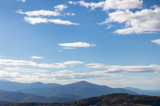 Layers of the Blue Ridge Mountains of North Carolina, blue sky with white clouds above, Appalachian landscape, horizontal aspect