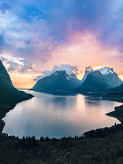Sunset Senja island in Norway aerial view mountains and fjord landscape Bergsbotn viewpoint scenery...