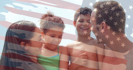 Image of waving usa flag over happy caucasian family