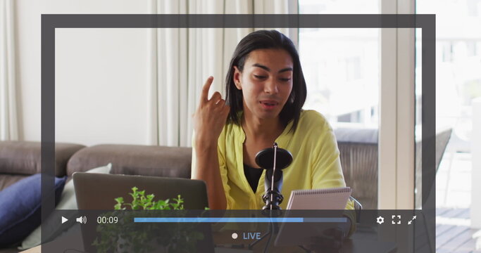 Fototapeta Image of screen with digital interface over biracial woman on makeup vlog