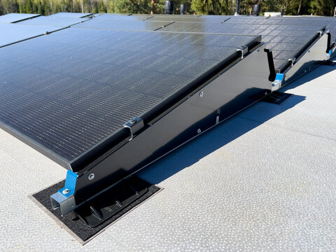 Photovoltaic system.  Solar Panels on Flat Roof. Roof Solar Mounting System