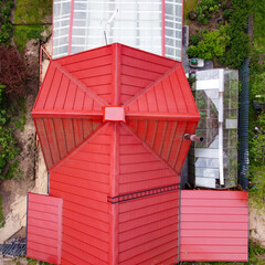 Red Metal Roof. Classic Design. Standing Seam Red Roof