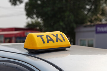 Russian yellow taxi sign