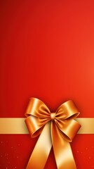 Red ribbon with bow on gold background, Christmas card concept. Space for text. Red and Gold Background