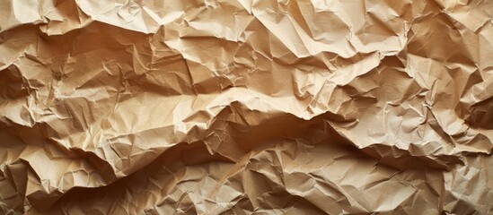 Detailed view of a textured, wrinkled piece of brown kraft paper.