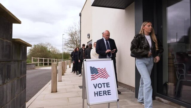 4K: Group of Voters stand in line at Polling Place for the USA Election.  People queuing up. Stock Video Clip Footage