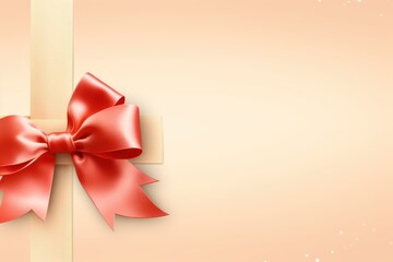 Red ribbon with bow on peach background, Christmas card concept. Space for text. Red and Peach Background