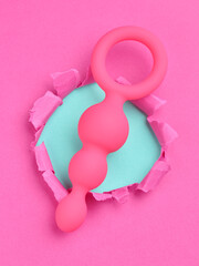 dildo sex toy over pink background
