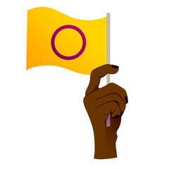 main non genrée qui porte le drapeau de l'intersexuation de la communauté lgbtqia+ 