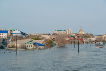 flood in Orenburg, the Urol river overflowed its banks and flooded the embankment and residential buildings