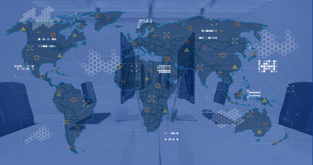 Image of financial data processing and world map over office with computers on desks