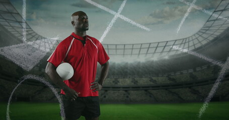 Image of position plan over african american man with rugby ball at stadium
