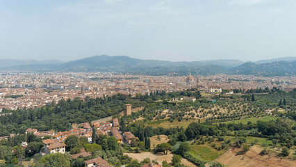 Fototapeta na wymiar Florence, Italy. Panoramic view of the city. Dome of Cathedral Santa Maria del Fiore. Summer, Aerial View