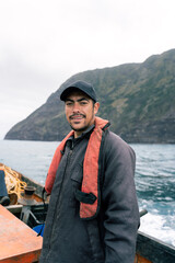 Fototapeta premium Portrait of a fisherman in a boat