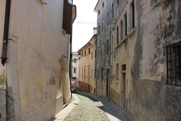 Fototapeta premium Narrow street in a big city.