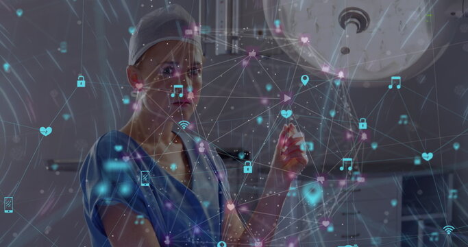 Image of network of connections and moving lights over caucasian female doctor