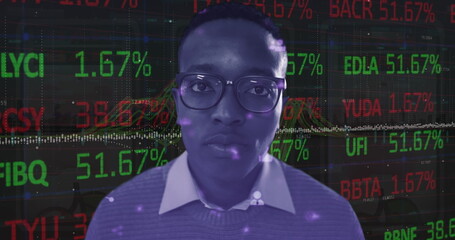 Image of statistics and financial data processing over african american man