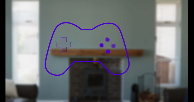 Image of gamepad icon over house interior