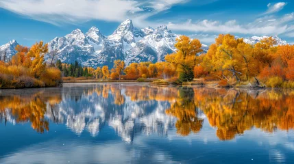 Cercles muraux Chaîne Teton Snow covered grand tetons range reflected in the calm