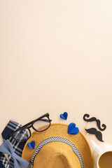 Commemorate Dad's special day with this festive vertical top view display: straw hat, classy tie, glasses, mustache props, hearts arranged on gentle beige surface. Great for expressing warm wishes