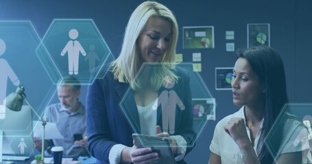 Image of digital icons and data processing over diverse business woman using tablet