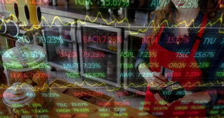 Image of multicolored trading board over caucasian female barista swiping credit card on reader