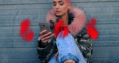 Image of red abstract patterns over caucasian hipster woman using smartphone