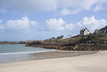 Tregastel, France - Apr 9, 2024: Wonderful landscapes in France, Brittany. The Greve Rose beach in...