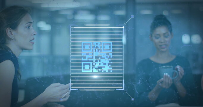 Image of qr code over diverse business people having meeting at office