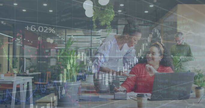 Image of financial data processing over diverse business people in office