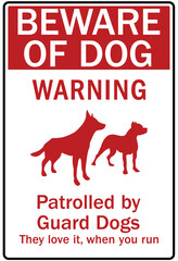 Beware of dog warning sign patrolled by guard dogs