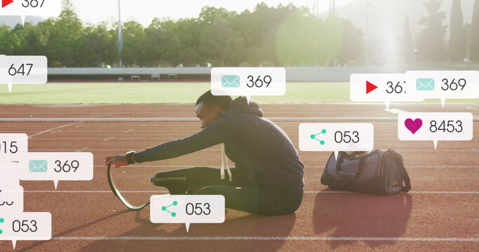 Fototapeta Image of notification bars over african american athlete performing stretching on race track