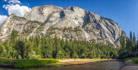 Half Dome during summer from Mirror Lake Trail, with the mirror lake dry.