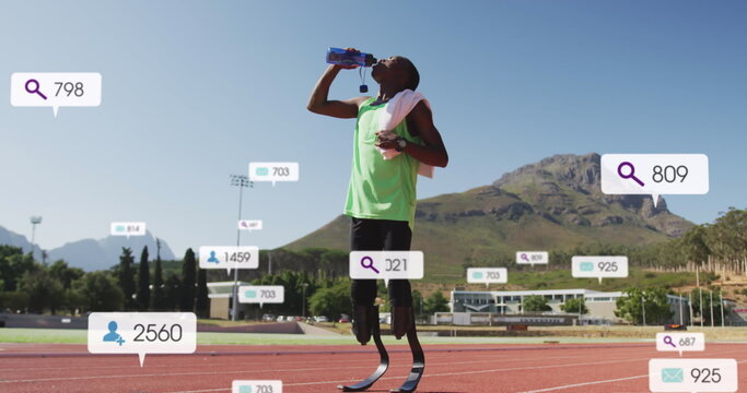 Image of notification bars over african american athlete drinking water after practice