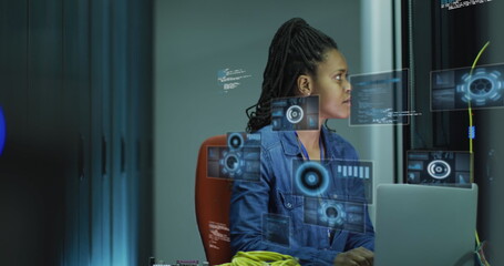 Image of data processing over african american businesswoman by computer servers