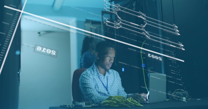 Image of data processing over african american male it technician working by computer servers