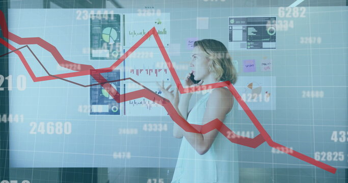 Image of red lines and data processing over caucasian businesswoman in office