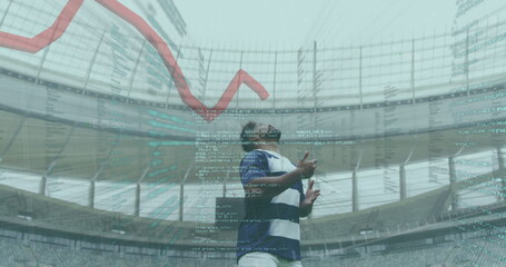 Image of data and graph over biracial male rugby player catching a ball digital composite - Powered by Adobe