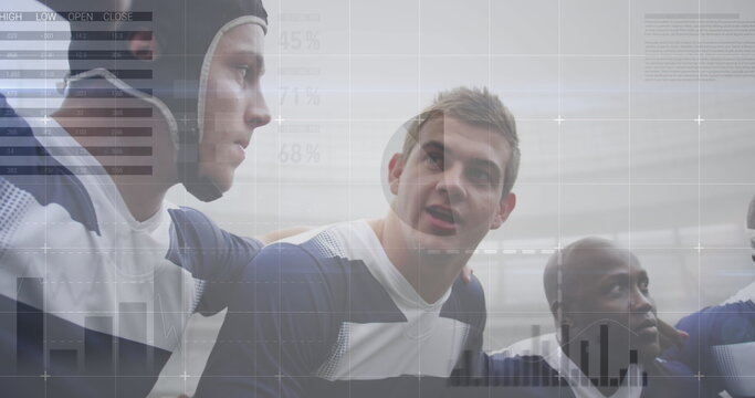 Image of graphs, data and statistics over multi-ethnic male rugby team standing in a huddle digital  - Powered by Adobe