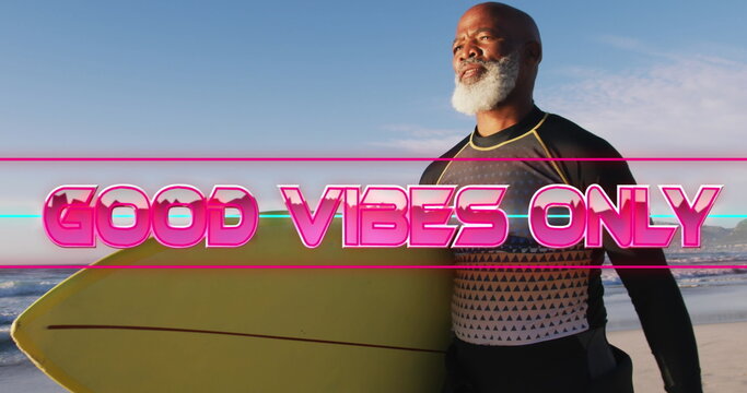 Image of good vibes only text with african american man holding surfboard